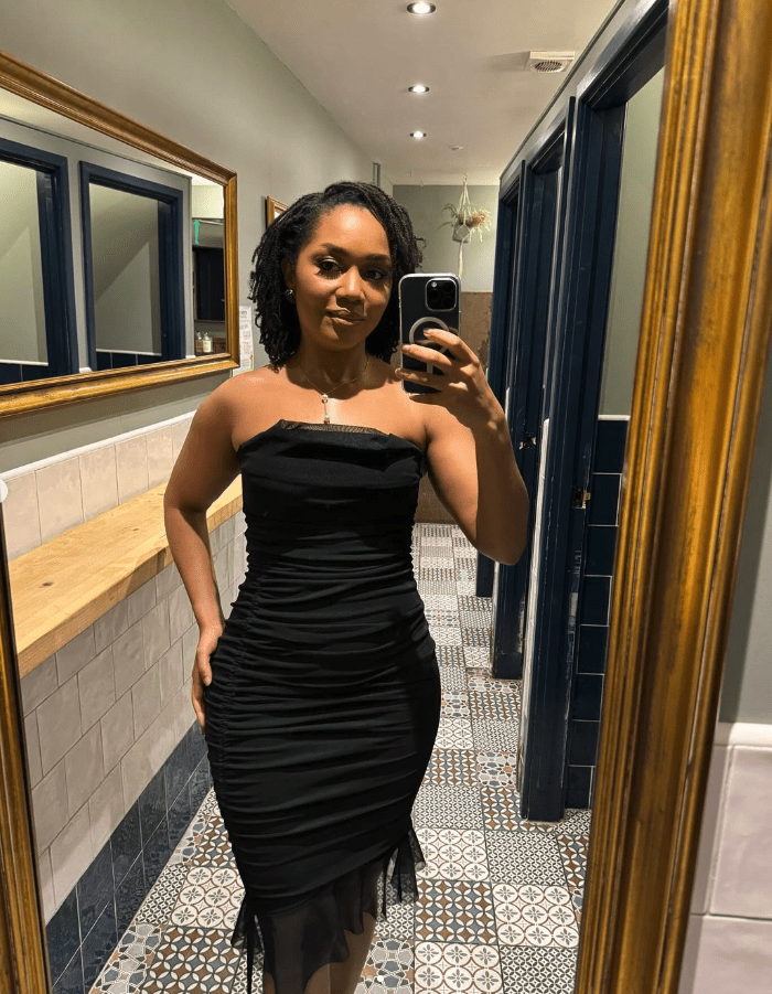 carol at 150lbs in black dress